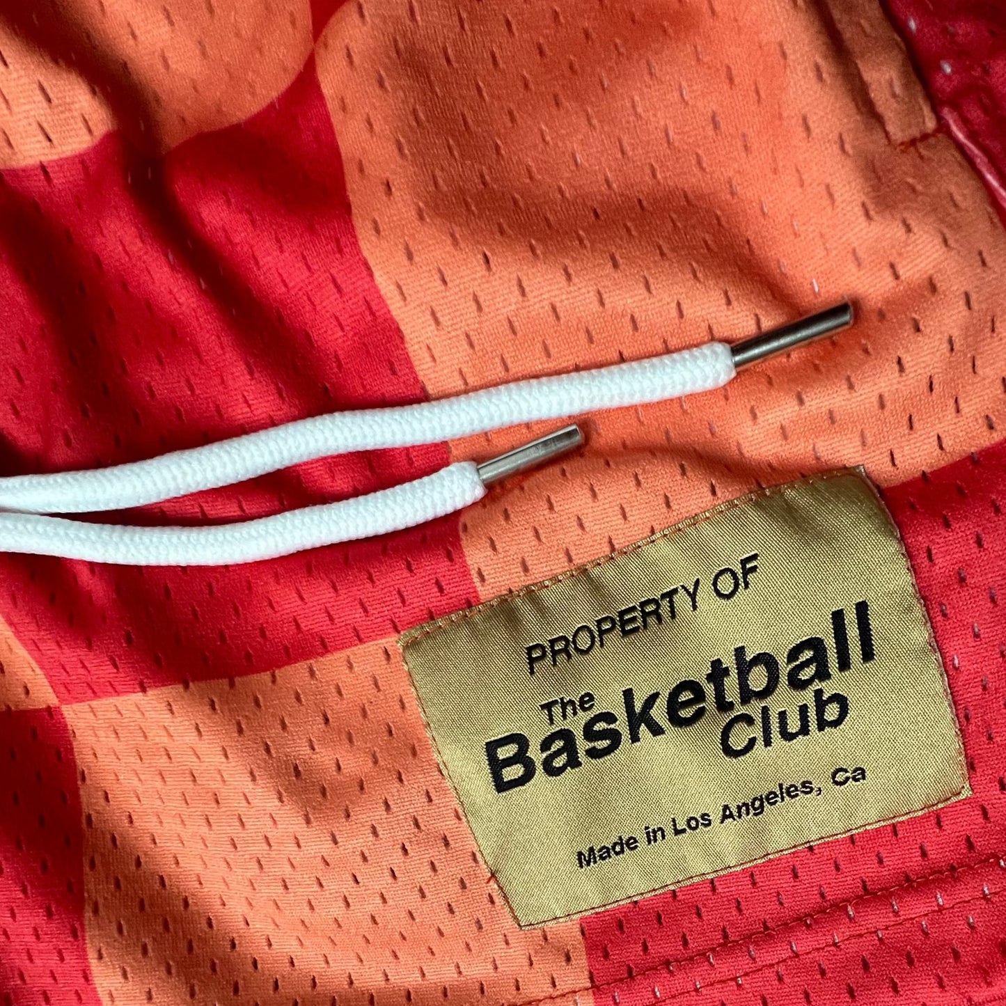 The Basketball Club Checkered Shorts "Orange"